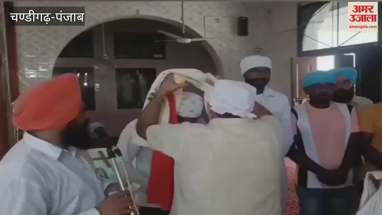 Young man honoured for crossing water in Moga by sitting on his knees and carrying 30 school children on his back
