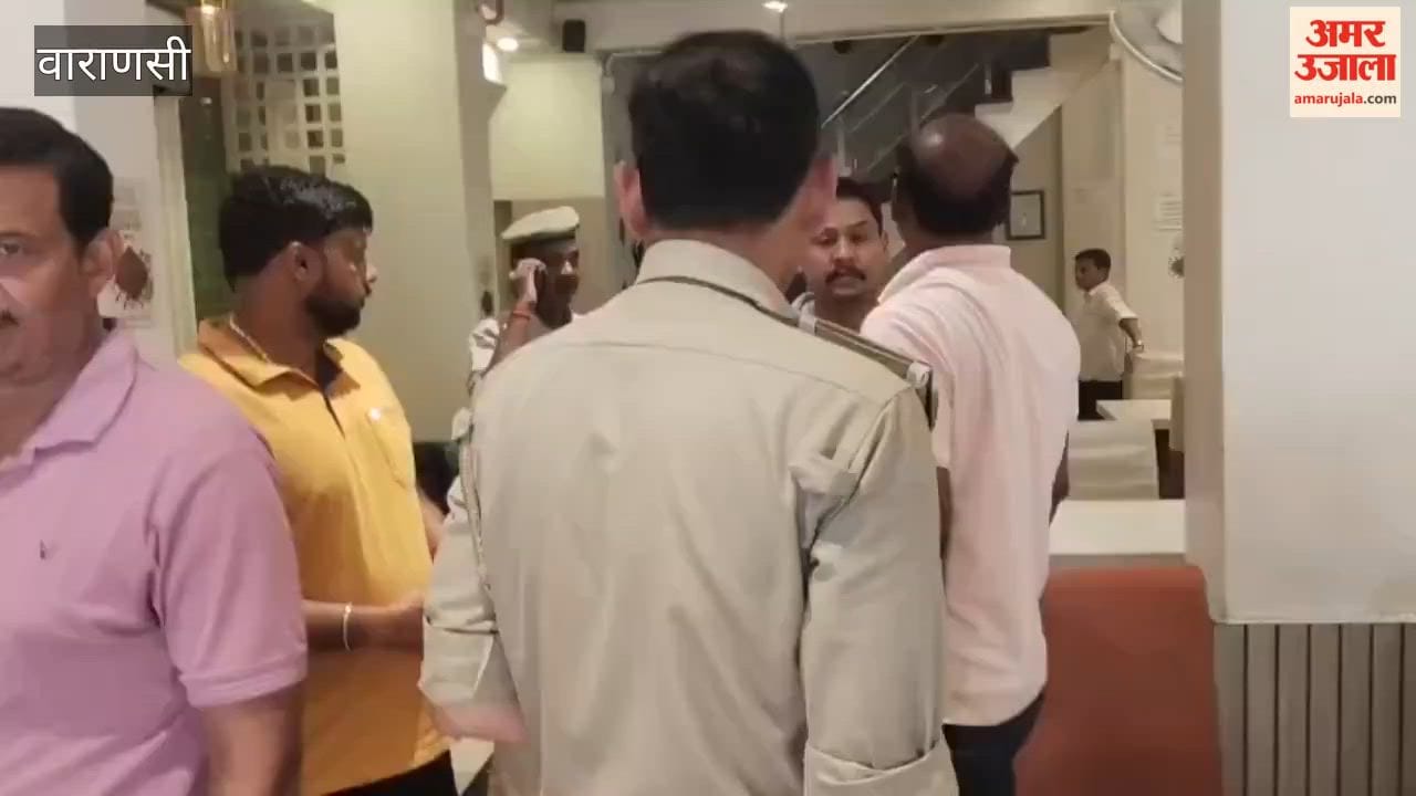 Fire breaks out in hotel kitchen staff bring it under control using fire-fighting equipment